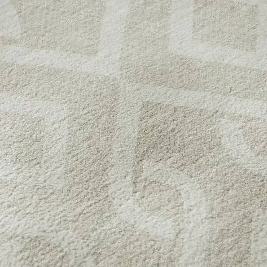 8' Beige And Ivory Geometric Washable Round Rug With UV Protection Photo 9