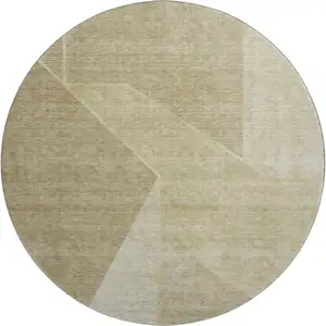 Photo of 8' Beige And Ivory Geometric Washable Round Rug With UV Protection