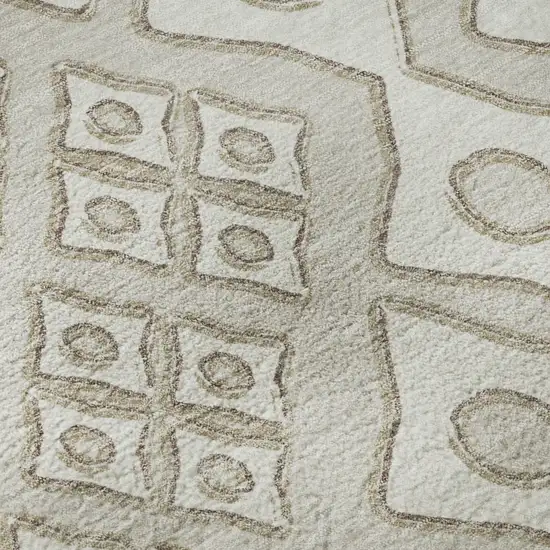 8' Beige And Ivory Geometric Washable Round Rug With UV Protection Photo 9