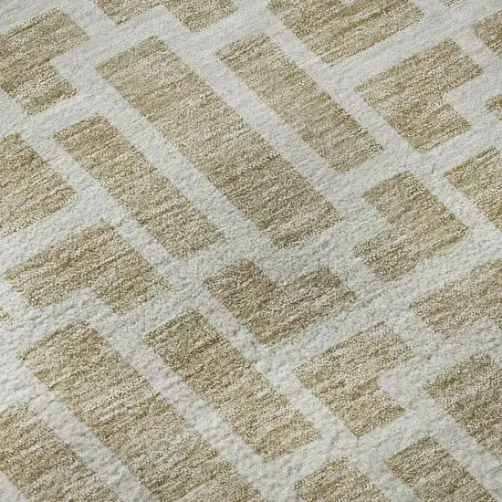 8' Beige And Ivory Geometric Washable Round Rug With UV Protection Photo 8