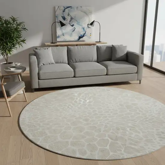 8' Beige And Ivory Geometric Washable Round Rug With UV Protection Photo 2