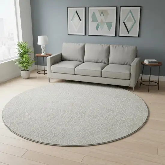 8' Beige And Ivory Geometric Washable Round Rug With UV Protection Photo 2