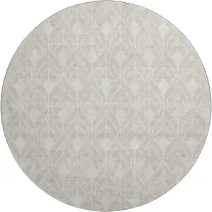 Photo of 8' Beige And Ivory Geometric Washable Round Rug With UV Protection