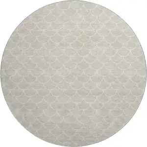 Photo of 8' Beige And Ivory Geometric Washable Round Rug With UV Protection