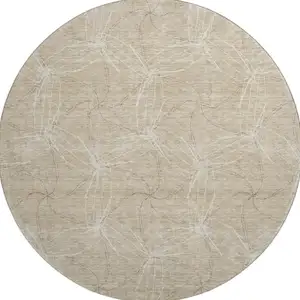 Photo of 8' Beige And Ivory Geometric Washable Round Rug With UV Protection