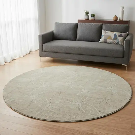 8' Beige And Ivory Geometric Washable Round Rug With UV Protection Photo 2