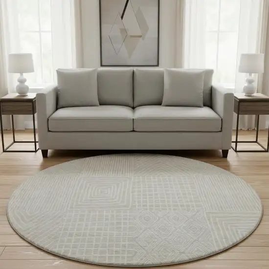 8' Beige And Ivory Geometric Washable Round Rug With UV Protection Photo 2