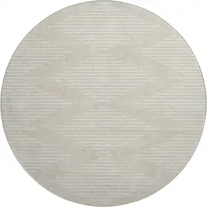 Photo of 8' Beige And Ivory Geometric Washable Round Rug With UV Protection