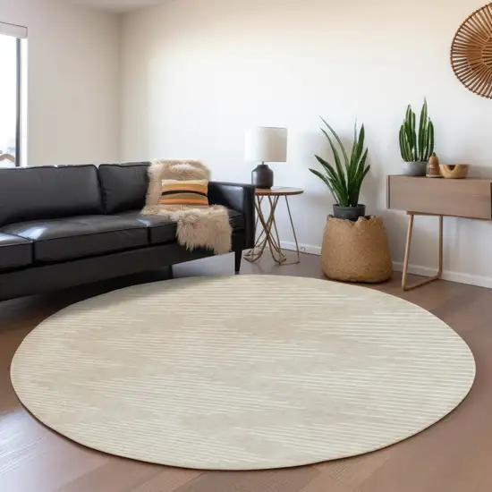 8' Beige And Ivory Geometric Washable Round Rug With UV Protection Photo 3