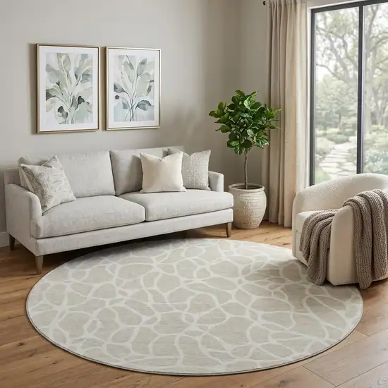 8' Beige And Ivory Geometric Washable Round Rug With UV Protection Photo 1