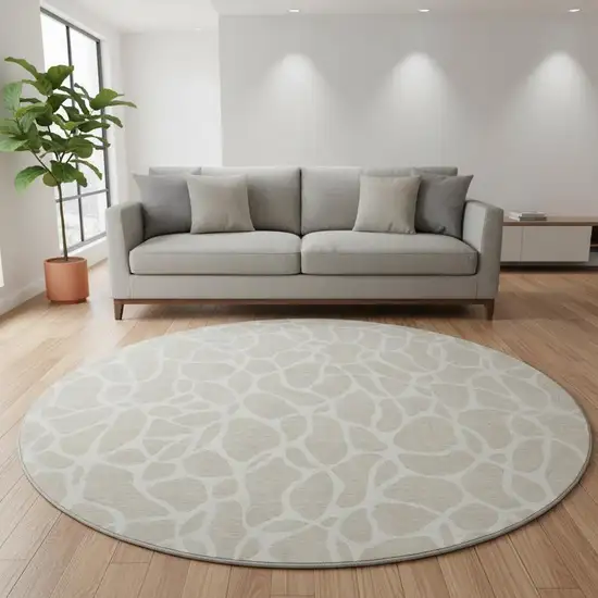 8' Beige And Ivory Geometric Washable Round Rug With UV Protection Photo 2