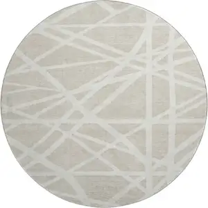 Photo of 8' Beige And Ivory Geometric Washable Round Rug With UV Protection