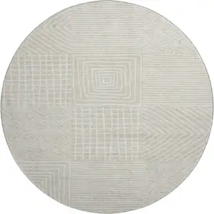 Photo of 8' Beige And Ivory Geometric Washable Round Rug With UV Protection