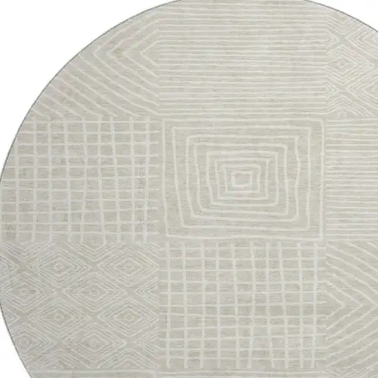 8' Beige And Ivory Geometric Washable Round Rug With UV Protection Photo 2