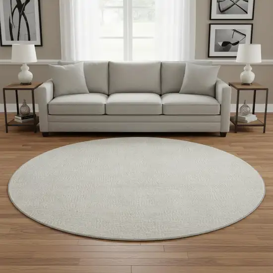 8' Beige And Ivory Geometric Washable Round Rug With UV Protection Photo 2