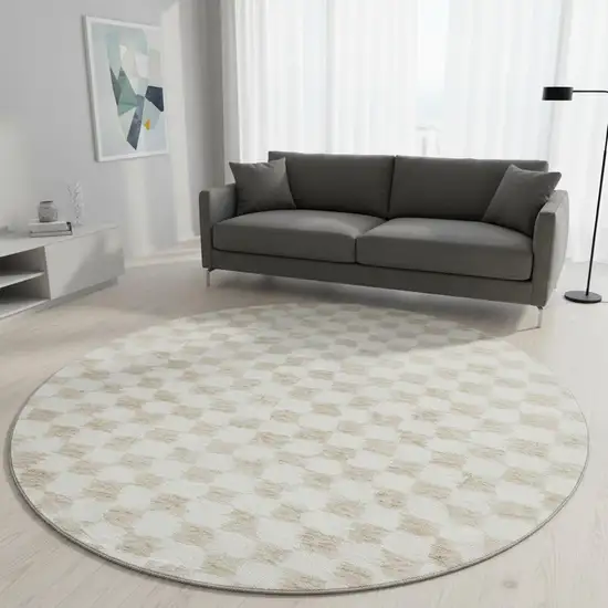 8' Beige And Ivory Geometric Washable Round Rug With UV Protection Photo 2