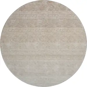 Photo of 8' Beige And Ivory Ombre Washable Round Rug With UV Protection