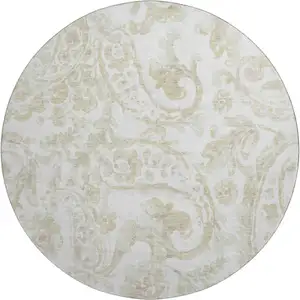 Photo of 8' Beige And Ivory Paisley Washable Round Rug With UV Protection