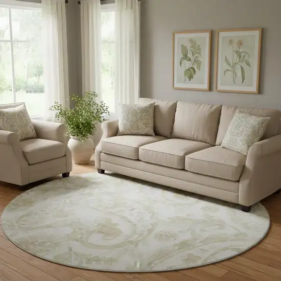 8' Beige And Ivory Paisley Washable Round Rug With UV Protection Photo 1