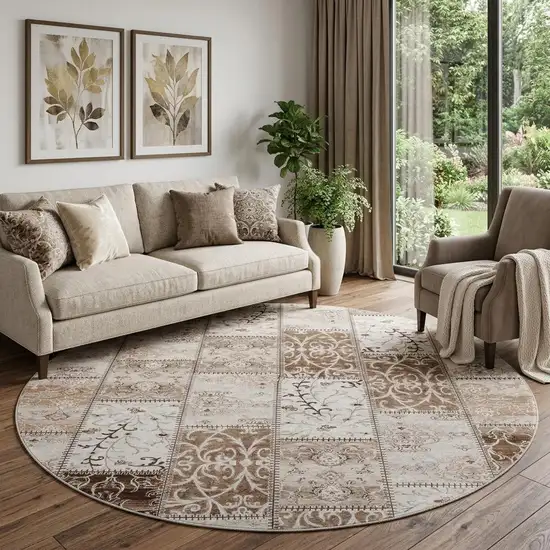 8' Beige And Ivory Patchwork Distressed Washable Round Rug With UV Protection Photo 1