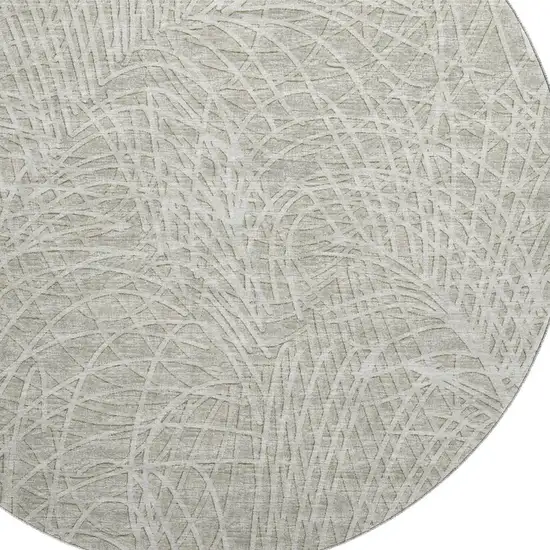 8' Beige And Ivory Round Abstract Washable Indoor Outdoor Area Rug Photo 5