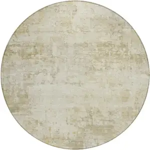 Photo of 8' Beige And Ivory Round Abstract Washable Indoor Outdoor Area Rug