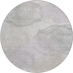 Photo of 8' Beige And Ivory Round Abstract Washable Indoor Outdoor Area Rug
