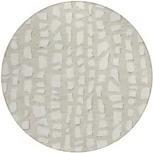 Photo of 8' Beige And Ivory Round Abstract Washable Indoor Outdoor Area Rug