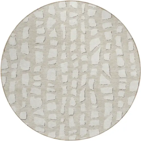8' Beige And Ivory Round Abstract Washable Indoor Outdoor Area Rug Photo 1