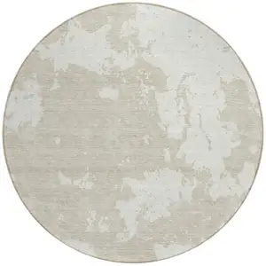 Photo of 8' Beige And Ivory Round Abstract Washable Indoor Outdoor Area Rug