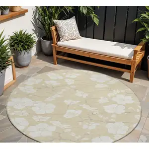 Photo of 8' Beige And Ivory Round Floral Washable Indoor Outdoor Area Rug