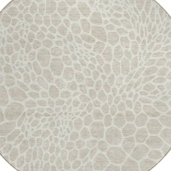 8' Beige And Ivory Round Geometric Washable Indoor Outdoor Area Rug Photo 4