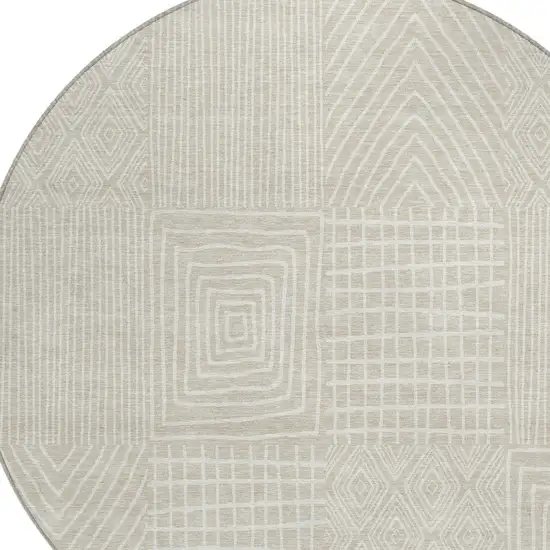 8' Beige And Ivory Round Geometric Washable Indoor Outdoor Area Rug Photo 4