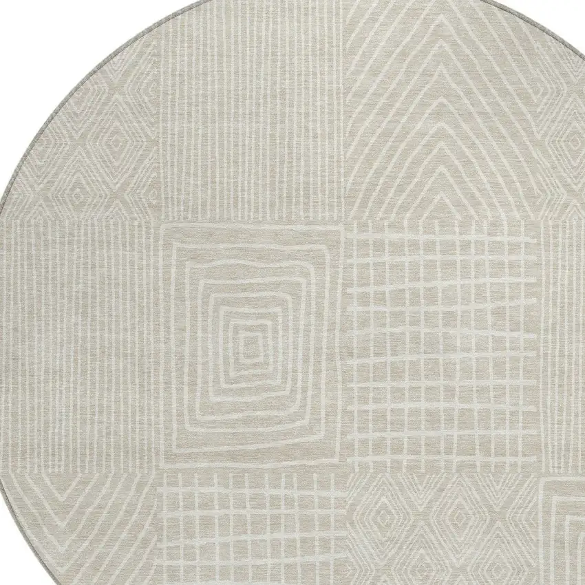 8' Beige And Ivory Round Geometric Washable Indoor Outdoor Area Rug Photo 4