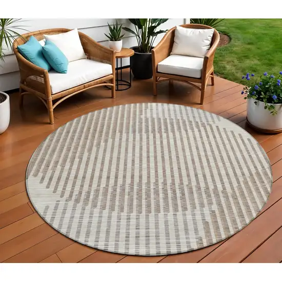 8' Beige And Ivory Round Geometric Washable Indoor Outdoor Area Rug Photo 1