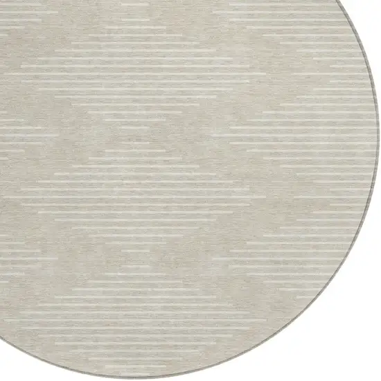 8' Beige And Ivory Round Geometric Washable Indoor Outdoor Area Rug Photo 4