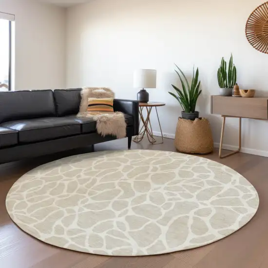 8' Beige And Ivory Round Geometric Washable Indoor Outdoor Area Rug Photo 7