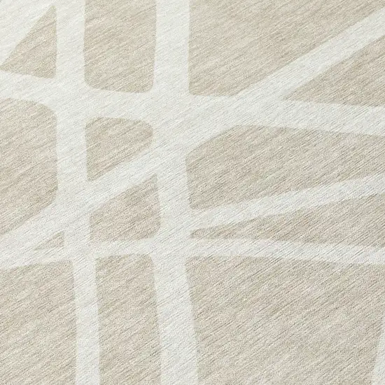 8' Beige And Ivory Round Geometric Washable Indoor Outdoor Area Rug Photo 7