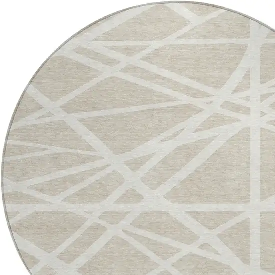 8' Beige And Ivory Round Geometric Washable Indoor Outdoor Area Rug Photo 2
