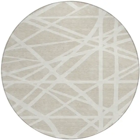 8' Beige And Ivory Round Geometric Washable Indoor Outdoor Area Rug Photo 1