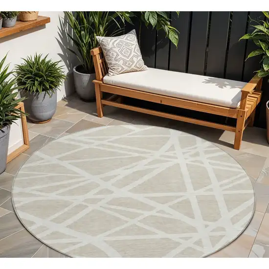8' Beige And Ivory Round Geometric Washable Indoor Outdoor Area Rug Photo 8