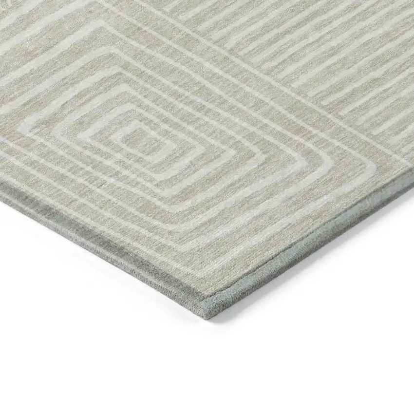8' Beige And Ivory Round Geometric Washable Indoor Outdoor Area Rug Photo 4