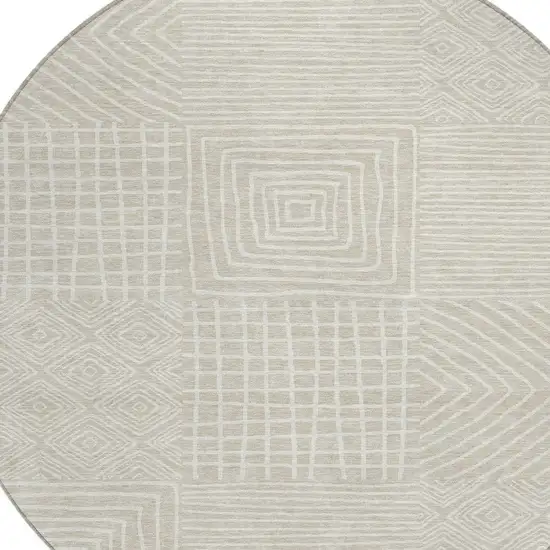 8' Beige And Ivory Round Geometric Washable Indoor Outdoor Area Rug Photo 5