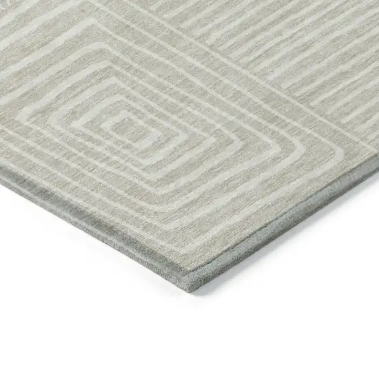 8' Beige And Ivory Round Geometric Washable Indoor Outdoor Area Rug Photo 4