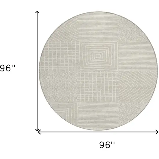 8' Beige And Ivory Round Geometric Washable Indoor Outdoor Area Rug Photo 7