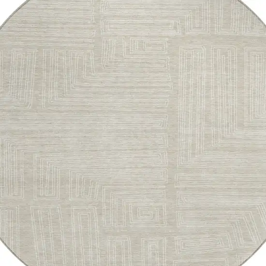 8' Beige And Ivory Round Geometric Washable Indoor Outdoor Area Rug Photo 5