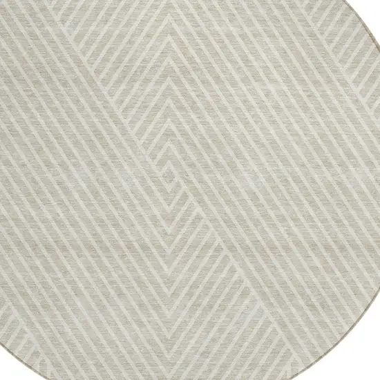 8' Beige And Ivory Round Geometric Washable Indoor Outdoor Area Rug Photo 4