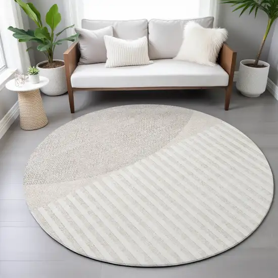 8' Beige And Ivory Round Geometric Washable Indoor Outdoor Area Rug Photo 7