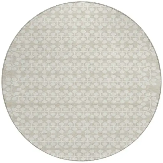 8' Beige And Ivory Round Geometric Washable Indoor Outdoor Area Rug Photo 4