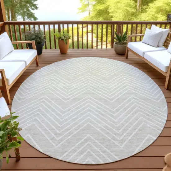 8' Beige And Ivory Round Geometric Washable Indoor Outdoor Area Rug Photo 4